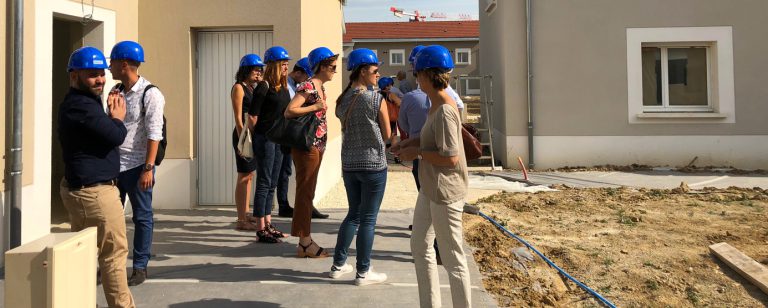 Photographie de groupe prise lors de visite de deux experts lors de la labellisation de l'écoquartier de Montévrain